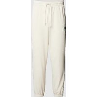 PUMA PERFORMANCE Sweatpants mit Logo-Stitching in Offwhite, Größe M von PUMA PERFORMANCE