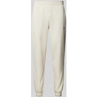 PUMA PERFORMANCE Sweatpants mit Logo-Stitching in Offwhite, Größe XXL von PUMA PERFORMANCE