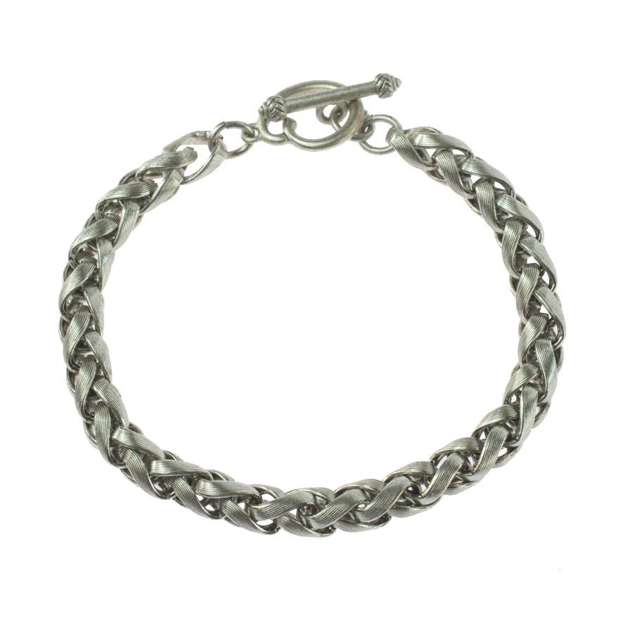 Vintage Oscar De La Renta Silberfarbenes Geflochtenes Armband Vintage Oscar De La Renta Silberfarbenes Geflochtenes Armband von PVDVintageJewelry