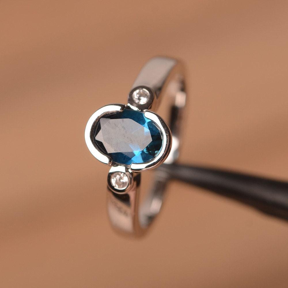 London Blautopas Ring Sterling Silber Verlobungsring Ovalen Blauen Edelstein London Blautopas Ring Sterling Silber Verlobungsring Ovalen Blauen Edelstein von PalmaryJewelry