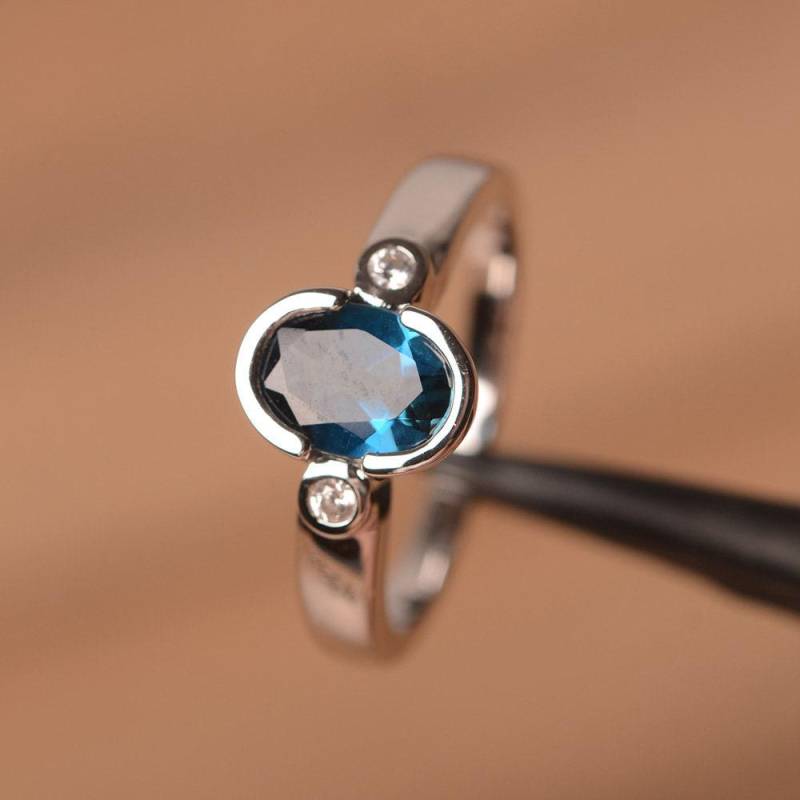 London Blautopas Ring Sterling Silber Verlobungsring Ovalen Blauen Edelstein London Blautopas Ring Sterling Silber Verlobungsring Ovalen Blauen Edelstein von PalmaryJewelry