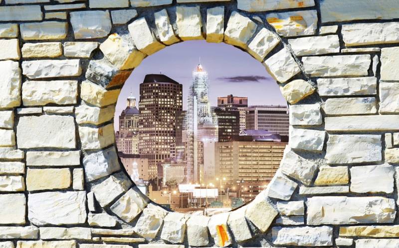 Papermoon Fototapete "Stadt hinter Mauer" von Papermoon