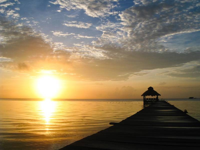 Papermoon Fototapete "Sunburst over Belize" glatt von Papermoon