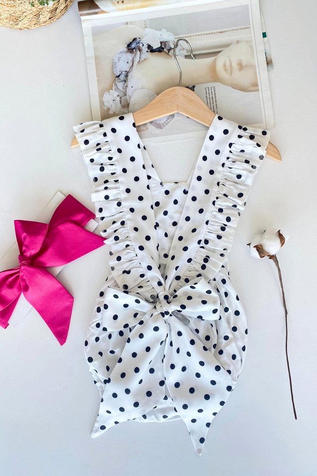 Parla Kids Strampler Zauberhafte Baby Salopette - weiß mit schwarzen Punkten - mit Haarband von Parla Kids