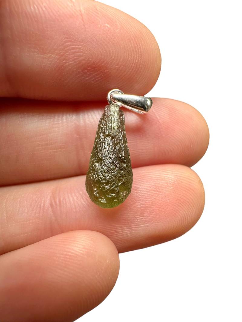 Silber Moldavit Anhänger 0, 9G Silber Moldavit Anhänger 0, 9G von PeltramMinerals