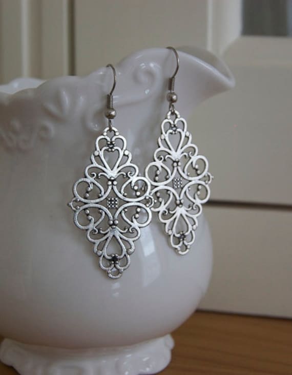 Ornamente Ohrringe in Silber von Perlenlagune
