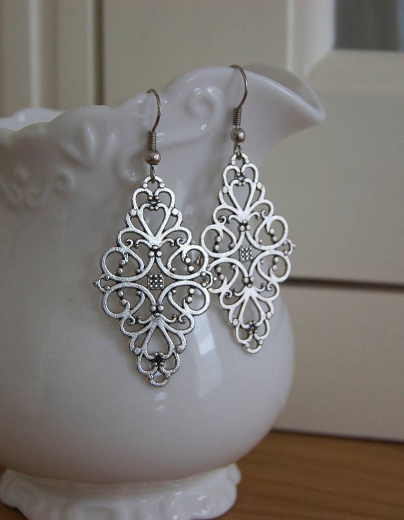Ornamente Ohrringe in Silber von Perlenlagune