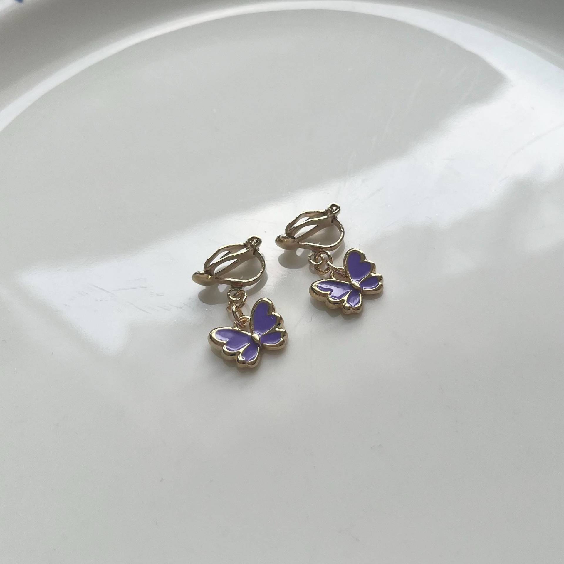 Schmetterlinge Ohrclips Hellgold Violett von Perlenlagune