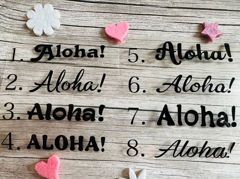 Bügelbild Aloha | Aloha. Zum Aufbügeln Verschiedene Farben Und Größen Aufbügler Aloha Warmtransfer Aufbügelbar T-Shirt Design von Personikat