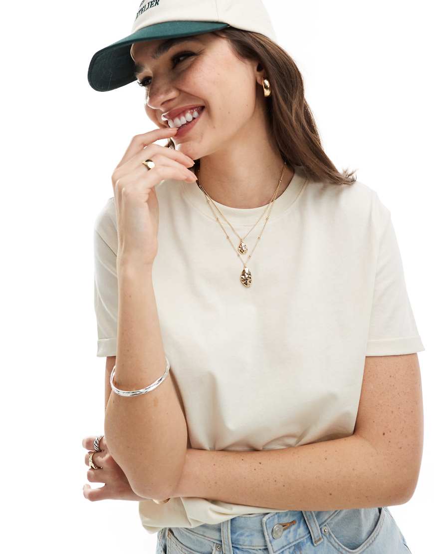 Pieces - Baumwoll-T-Shirt in Creme mit umgeschlagenen Ärmeln-Weiß Pieces - Baumwoll-T-Shirt in Creme mit umgeschlagenen Ärmeln-Weiß von Pieces