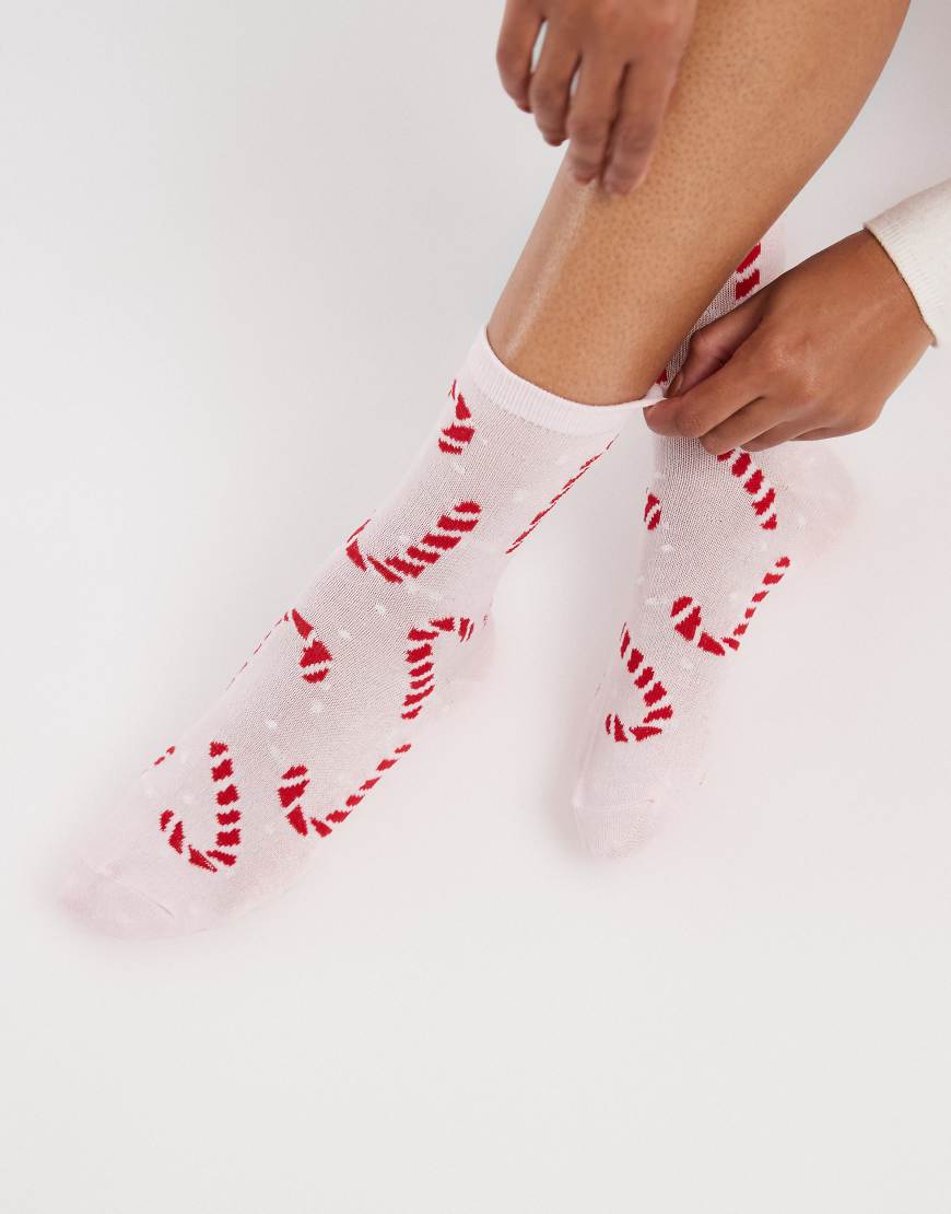 Pieces - Socken in Hellrosa mit weihnachtlichem Zuckerstangen-Muster von Pieces