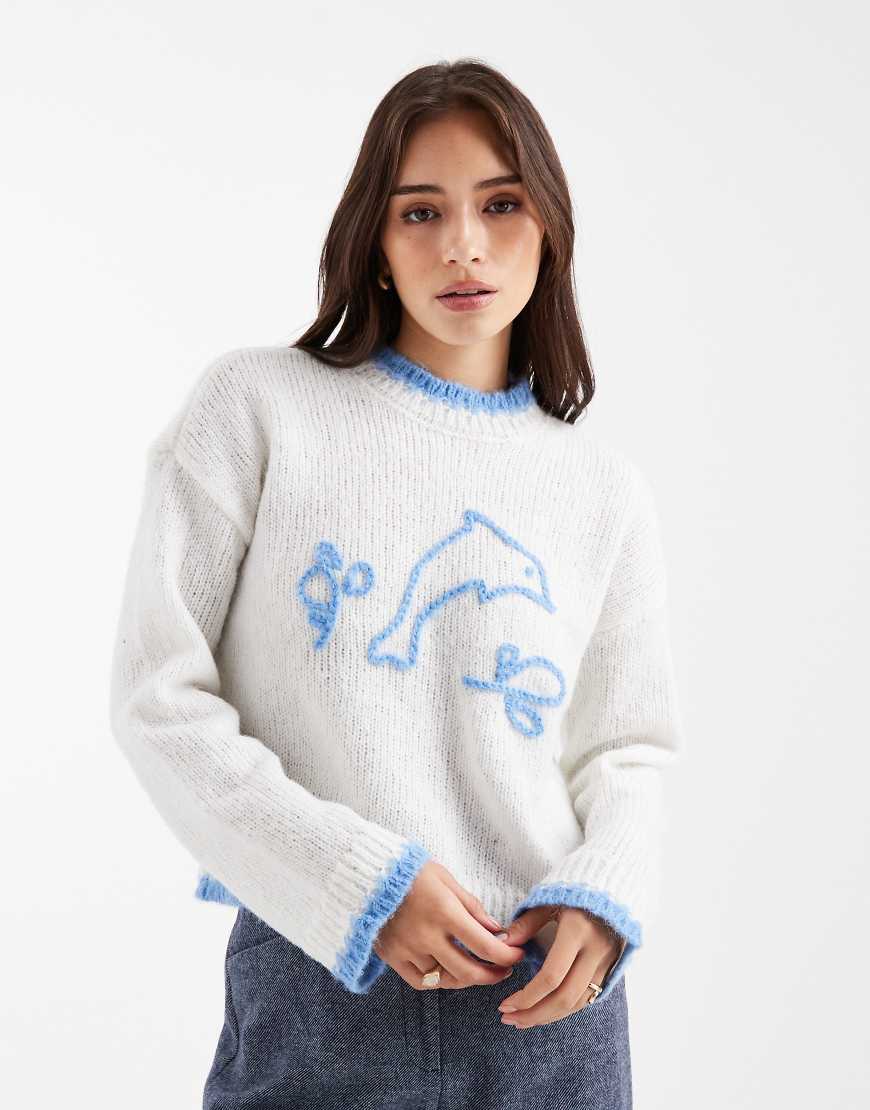 Pieces - Strickpullover in Creme mit Delfin-Motiv in Blau-Bunt Pieces - Strickpullover in Creme mit Delfin-Motiv in Blau-Bunt von Pieces