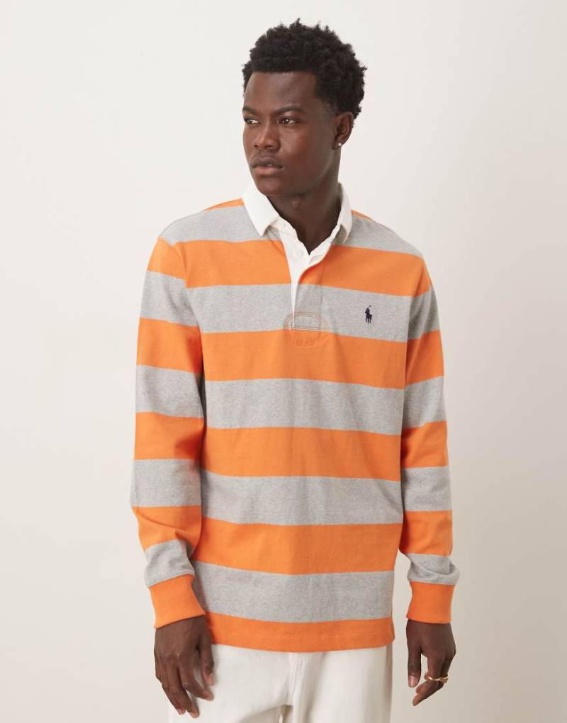 Polo Ralph Lauren - Langärmliges Rugby-Shirt mit Streifen mit in Orange und Grau sowie Logo-Symbol von Polo Ralph Lauren