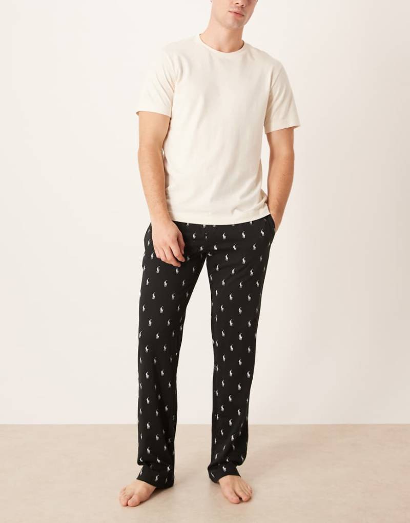 Polo Ralph Lauren - Lounge-Hose in Schwarz mit Markenlogo-Muster von Polo Ralph Lauren
