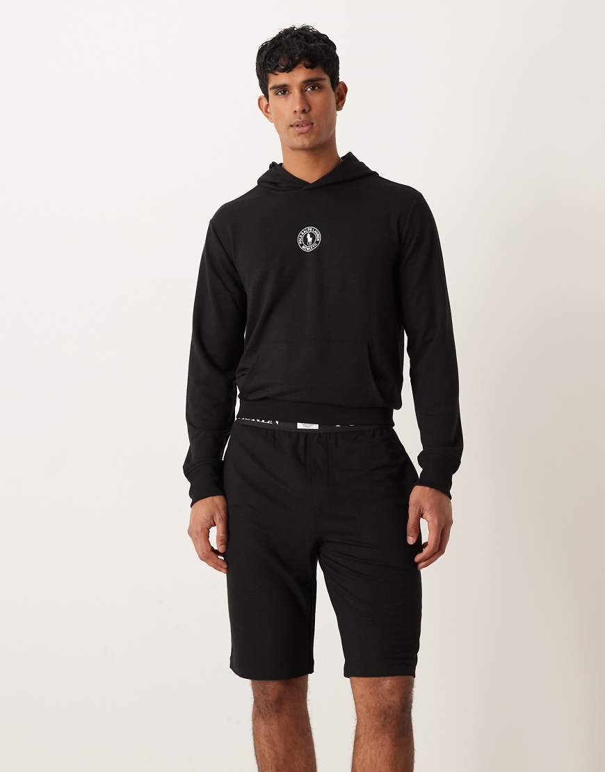 Polo Ralph Lauren - Schmal geschnittene Shorts in Schwarz mit Logo-Bund, Kombiteil Polo Ralph Lauren - Schmal geschnittene Shorts in Schwarz mit Logo-Bund, Kombiteil von Polo Ralph Lauren