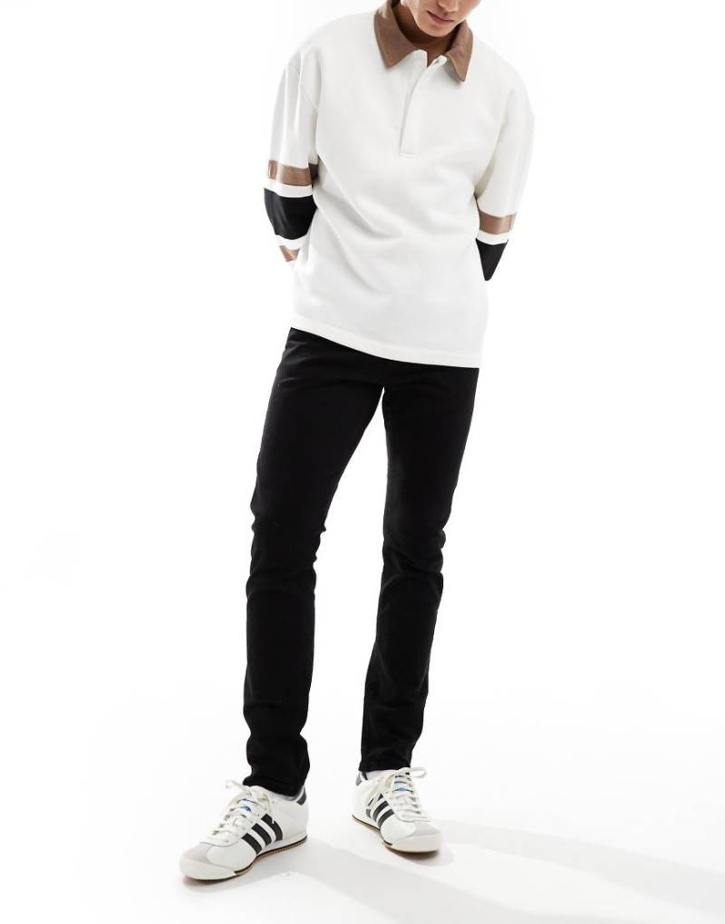 Polo Ralph Lauren - Sullivan - Schmal geschnittene Jeans in Schwarz mit Logo auf der Gesäßtasche von Polo Ralph Lauren