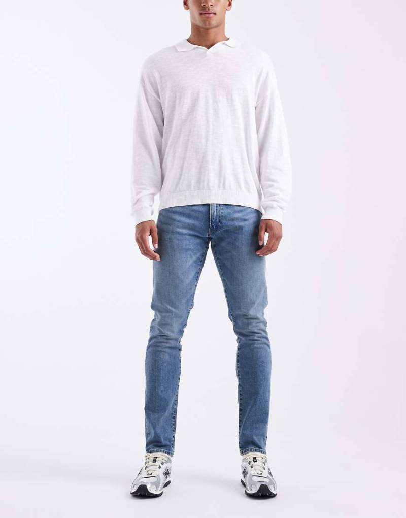 Polo Ralph Lauren - Sullivan - Schmal geschnittene Jeans in mittlerer Waschung mit Logo auf der Gesäßtasche-Blau von Polo Ralph Lauren