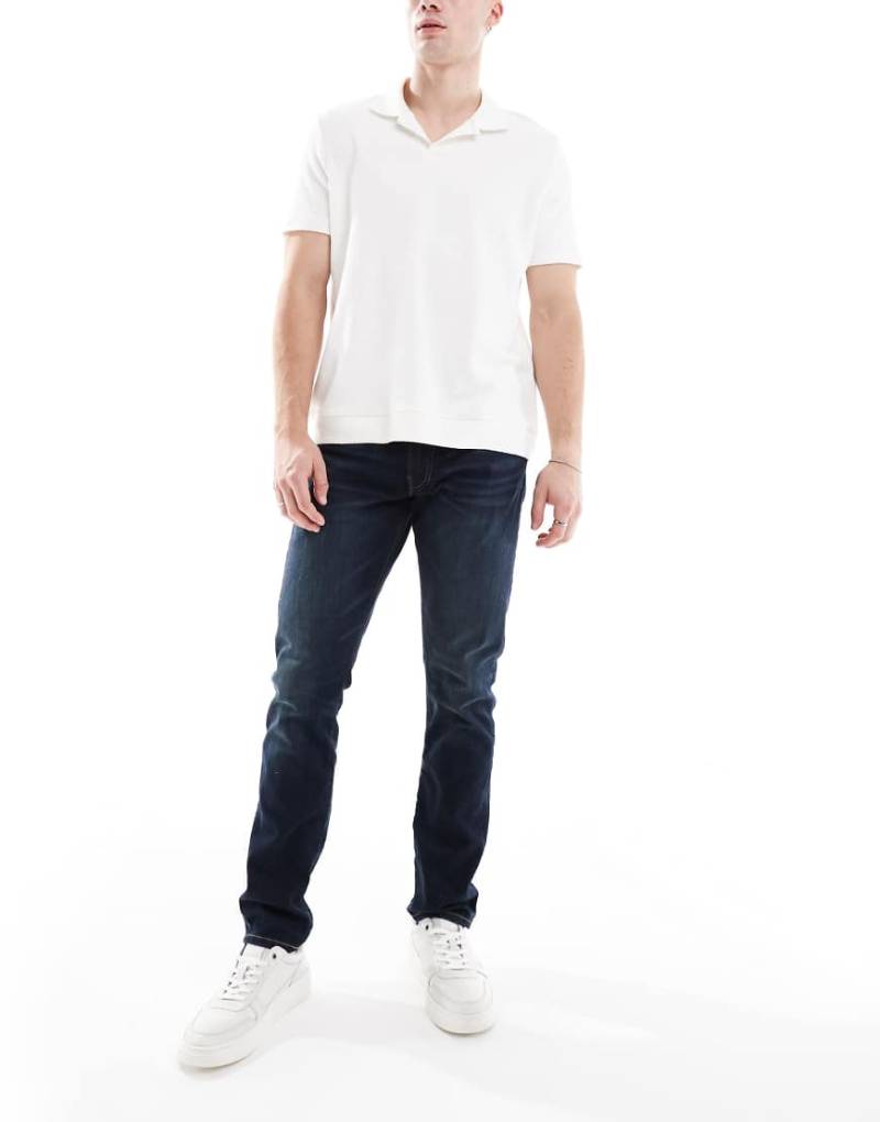 Polo Ralph Lauren - Sullivan - Schmal geschnittene Jeans in verwaschenem Schwarz-Marineblau von Polo Ralph Lauren