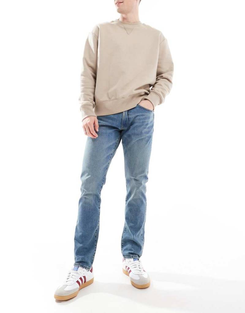 Polo Ralph Lauren - Sullivan - Slim-Fit-Jeans in mittelblauer Waschung mit Logo auf der Gesäßtasche von Polo Ralph Lauren