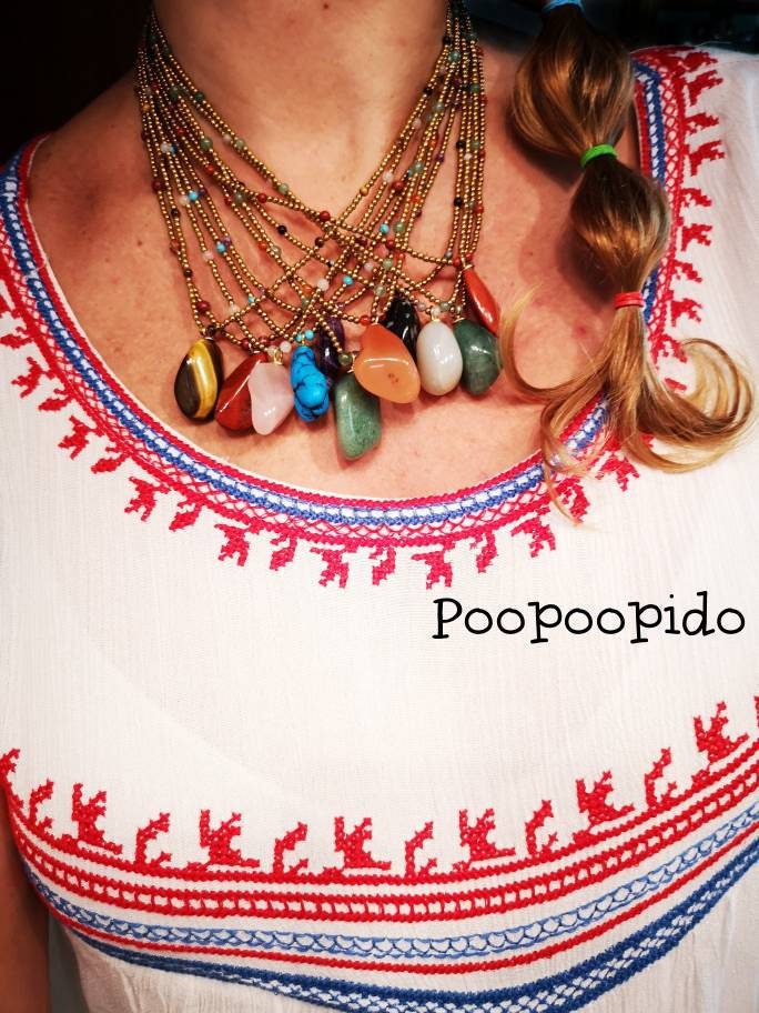 Bohoroskop-Halskette von Poopoopido