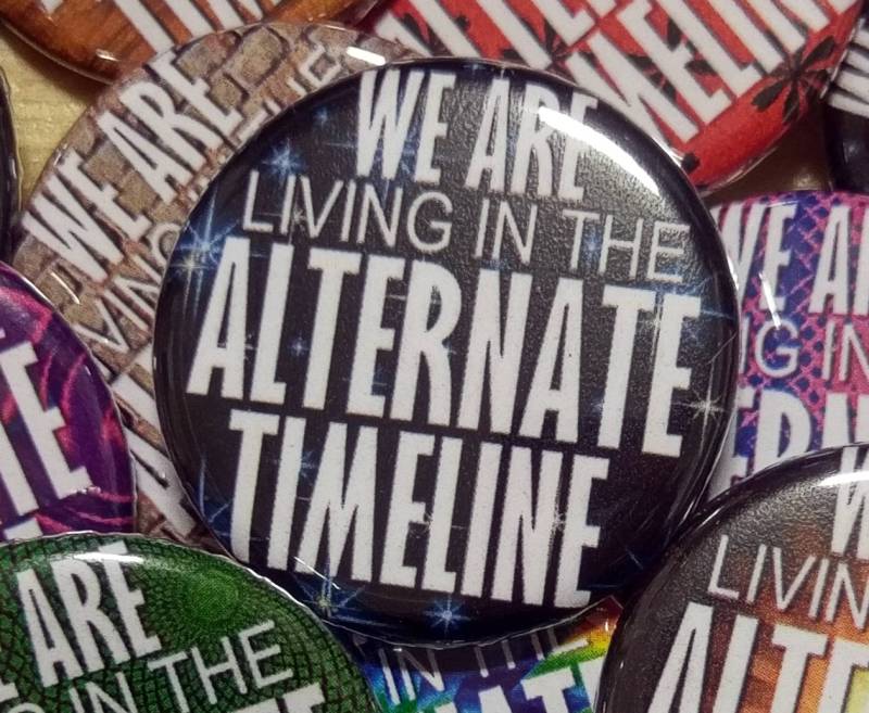 We Are Living in The Alterate Timeline 1.25" Pinback Button | Zufälliges Design von PortlandButtonWorks