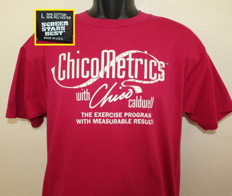 Chicometrics Chico Caldwell Fitness Programm Jahrgang T-Shirt L Pink Rosa 80Er Jahre 90Er Baumwolle Polyester Bildschirm Sterne Am Besten Chicometrics Chico Caldwell Fitness Programm Jahrgang T-Shirt L Pink Rosa 80Er Jahre 90Er Baumwolle Polyester Bildschirm Sterne Am Besten von PreserveVintage