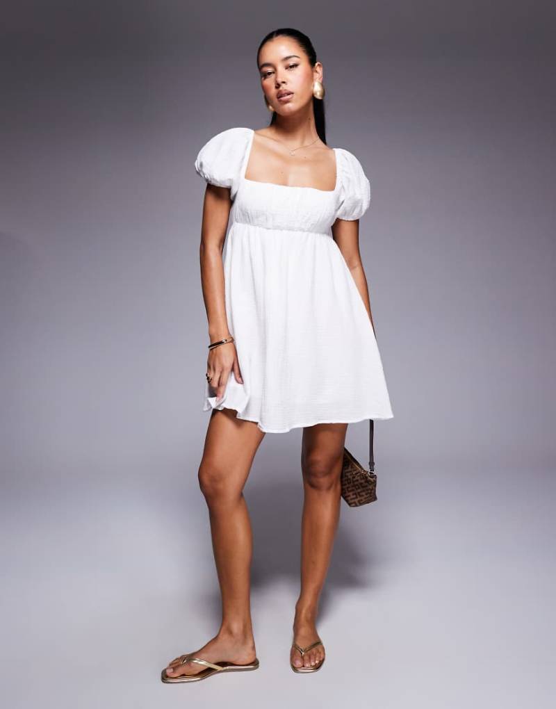 Princess Polly - Let's Dance - Kurzes Hängerkleid aus grob gewebter Baumwolle in Weiß mit Puffärmeln und Rückenausschnitt mit Bindedetails von Princess Polly