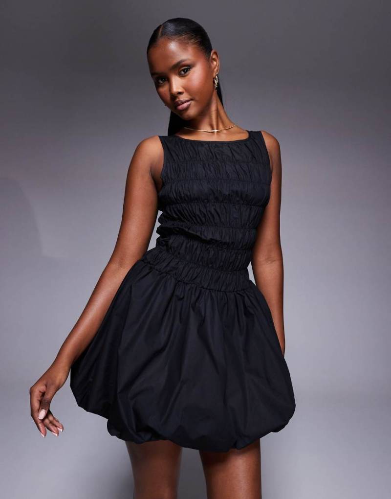 Princess Polly - Demure - Gesmoktes Minikleid in Schwarz mit Ballonsaum von Princess Polly