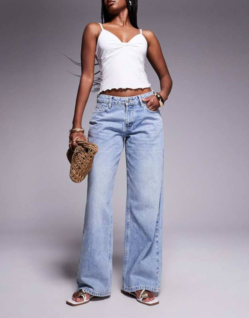 Princess Polly - Serenitia - Locker geschnittene Jeans in blauer Waschung mit mittelhohem Bund und weitem Bein von Princess Polly