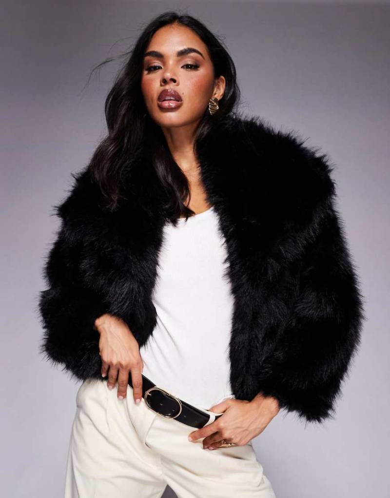 Princess Polly - Wayland - Mantel aus Kunstpelz in Schwarz mit Oversize-Kragen und weiten Ärmeln von Princess Polly