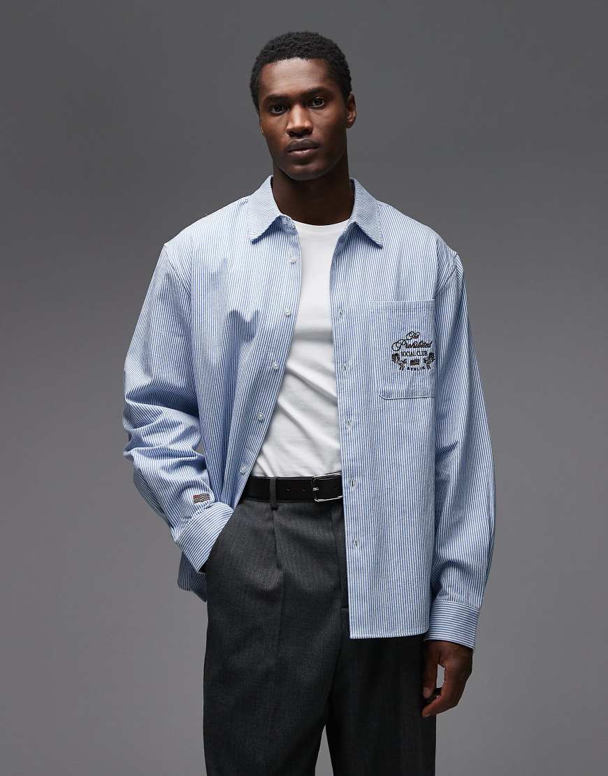 Prohibited - Langärmliges Polohemd in Blau gestreift mit Logo auf der Tasche von Prohibited