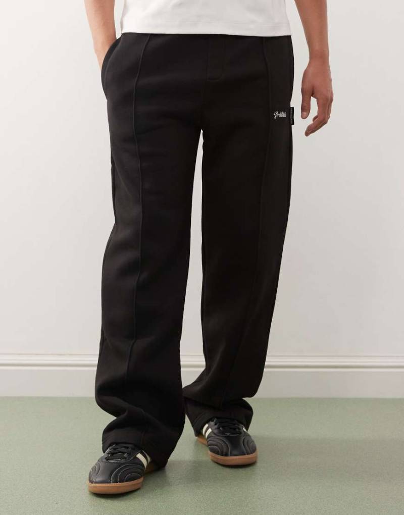 Prohibited - Locker geschnittene Oversize-Jogginghose in Schwarz mit Logo, 360 g/m² von Prohibited