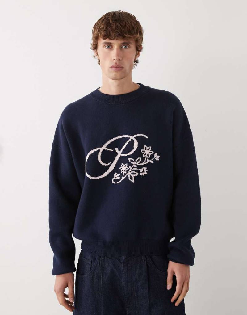 Prohibited - Oversize-Strickpullover in Marineblau mit Blüten-Logo von Prohibited