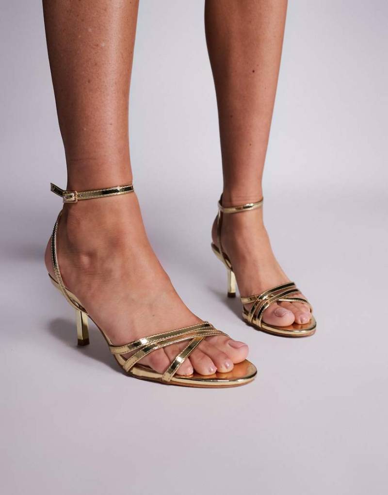 Public Desire - Juliette - Riemchen-Sandaletten in Gold-Goldfarben Public Desire - Juliette - Riemchen-Sandaletten in Gold-Goldfarben von Public Desire