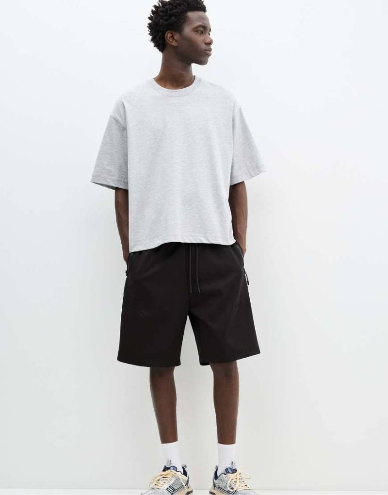 Pull & Bear - Bermuda-Joggingshorts aus Interlock-Stoff in Schwarz von Pull & Bear
