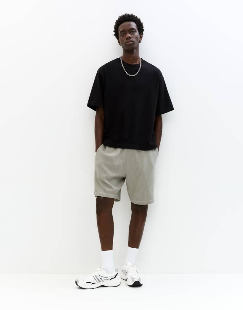 Pull & Bear - Bermudashorts aus Strick in Grau meliert mit Waffelstruktur von Pull & Bear