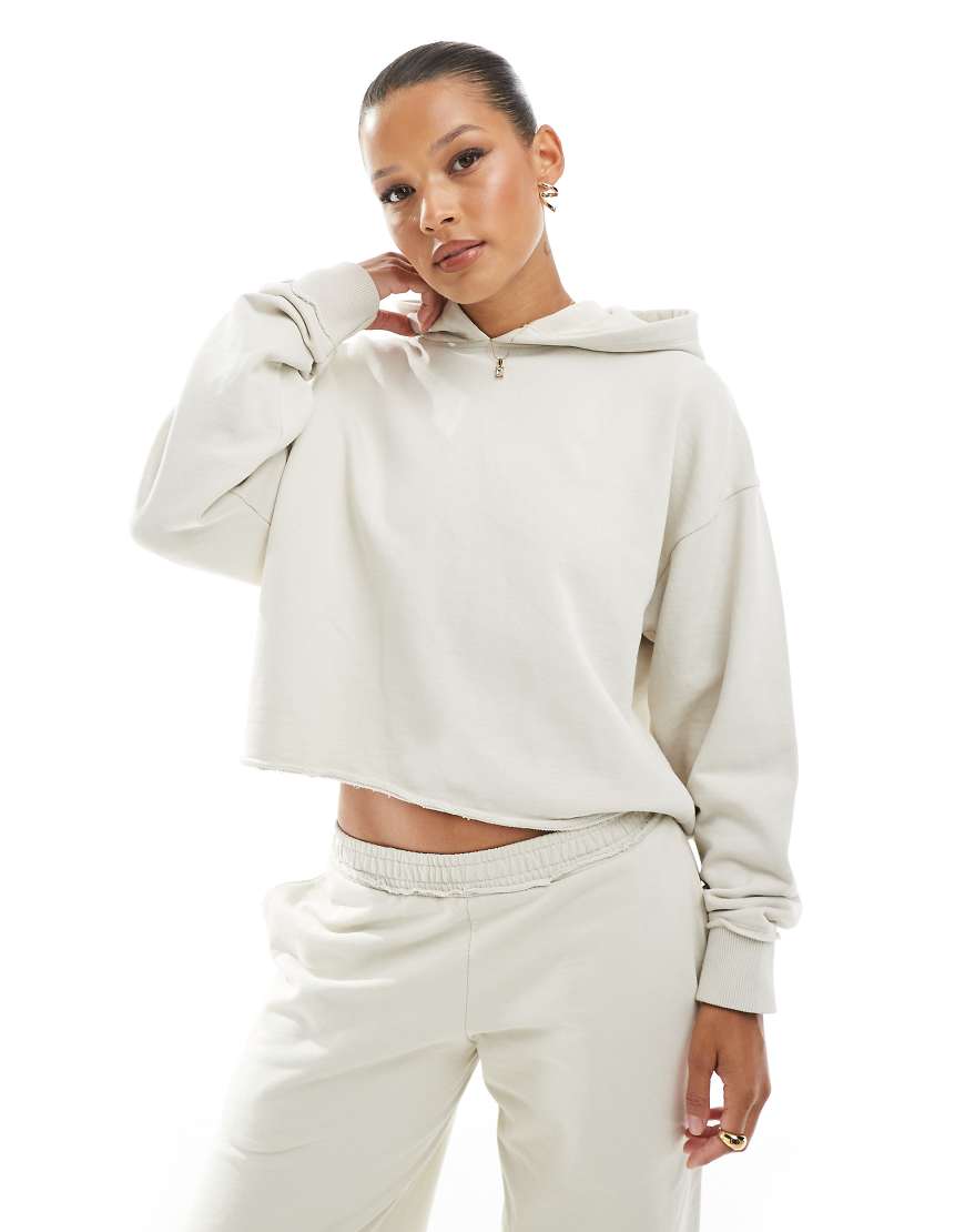Pull & Bear - Cropped Kapuzenpullover in Ecru mit offenem Saum, Kombiteil-Neutral von Pull & Bear