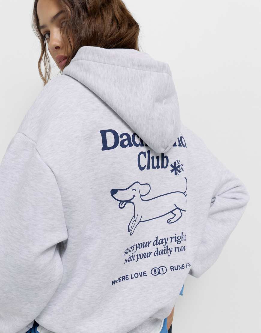 Pull & Bear - Kapuzenpullover in Grau meliert mit Hunde-Grafik von Pull & Bear