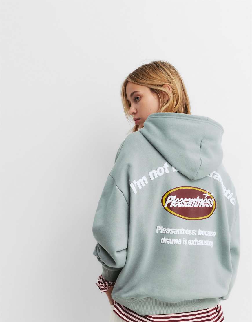 Pull & Bear - Kapuzenpullover in Grünblau mit „Dramatic"-Print von Pull & Bear