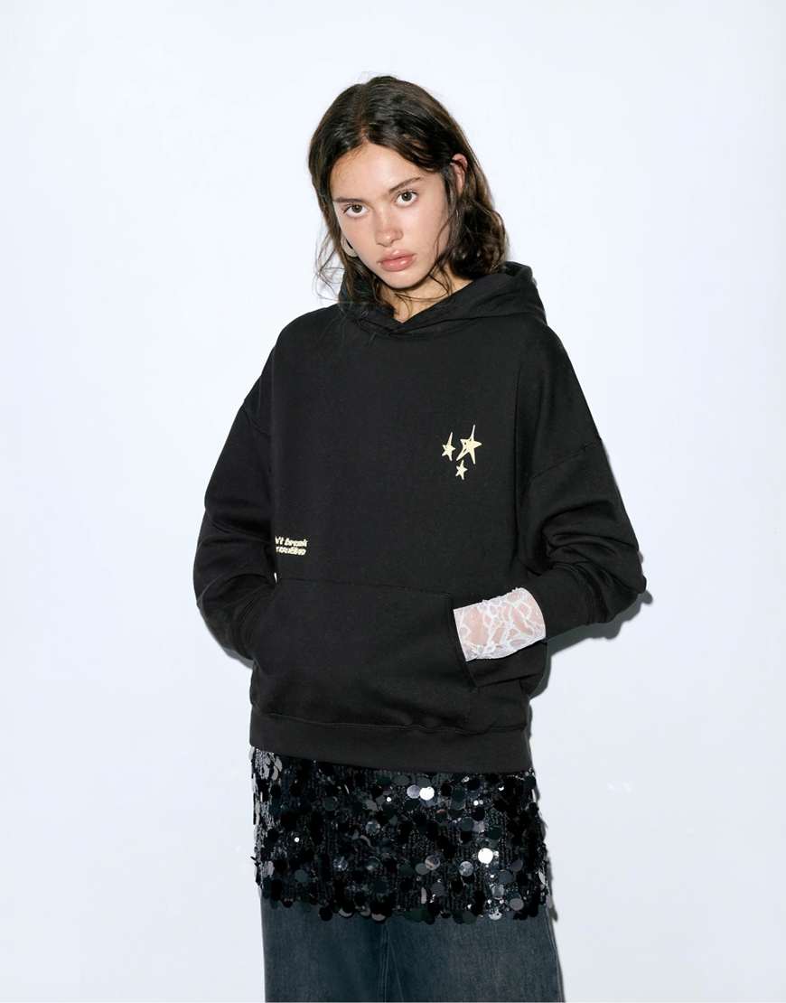 Pull & Bear - Kapuzenpullover in Schwarz mit Sternmotiven von Pull & Bear