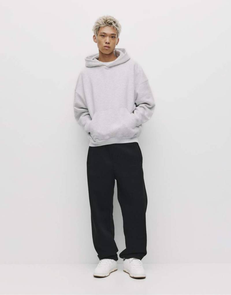 Pull & Bear - Kastiger Kapuzenpullover in meliertem Hellgrau von Pull & Bear