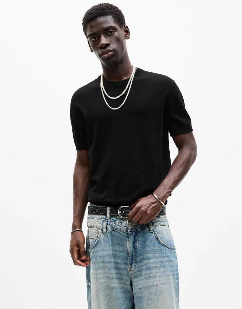 Pull & Bear - Kurzärmliges T-Shirt aus Strick in Schwarz von Pull & Bear