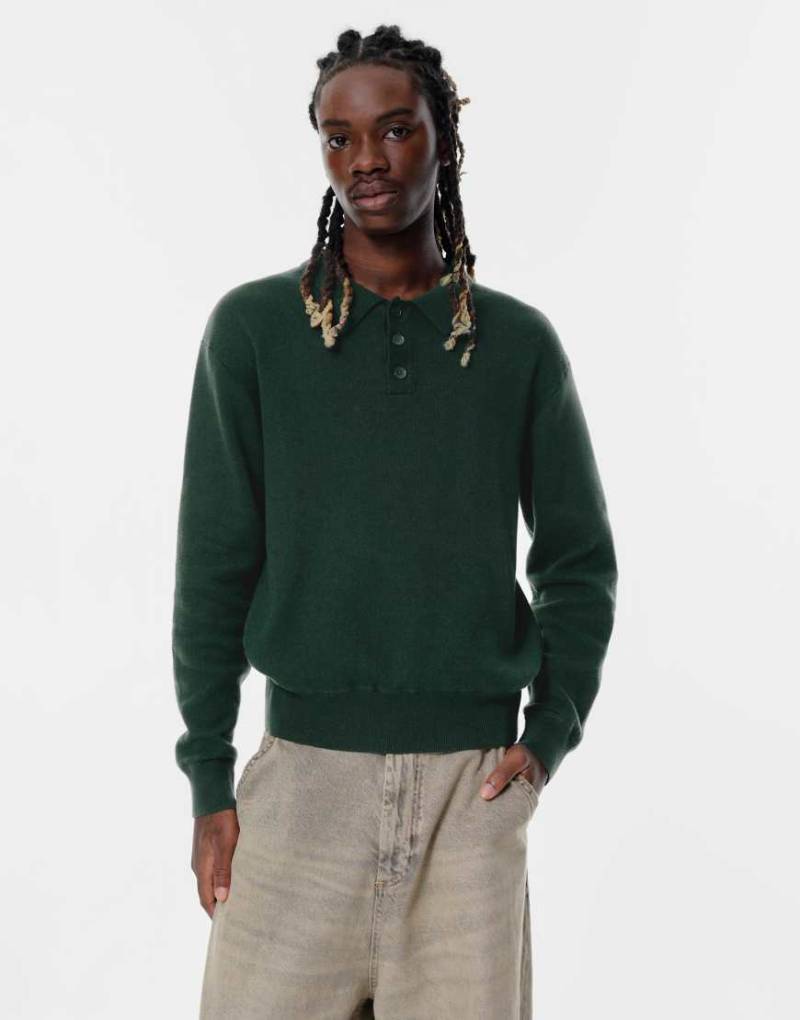 Pull & Bear - Langärmliges Polohemd in Dunkelgrün von Pull & Bear