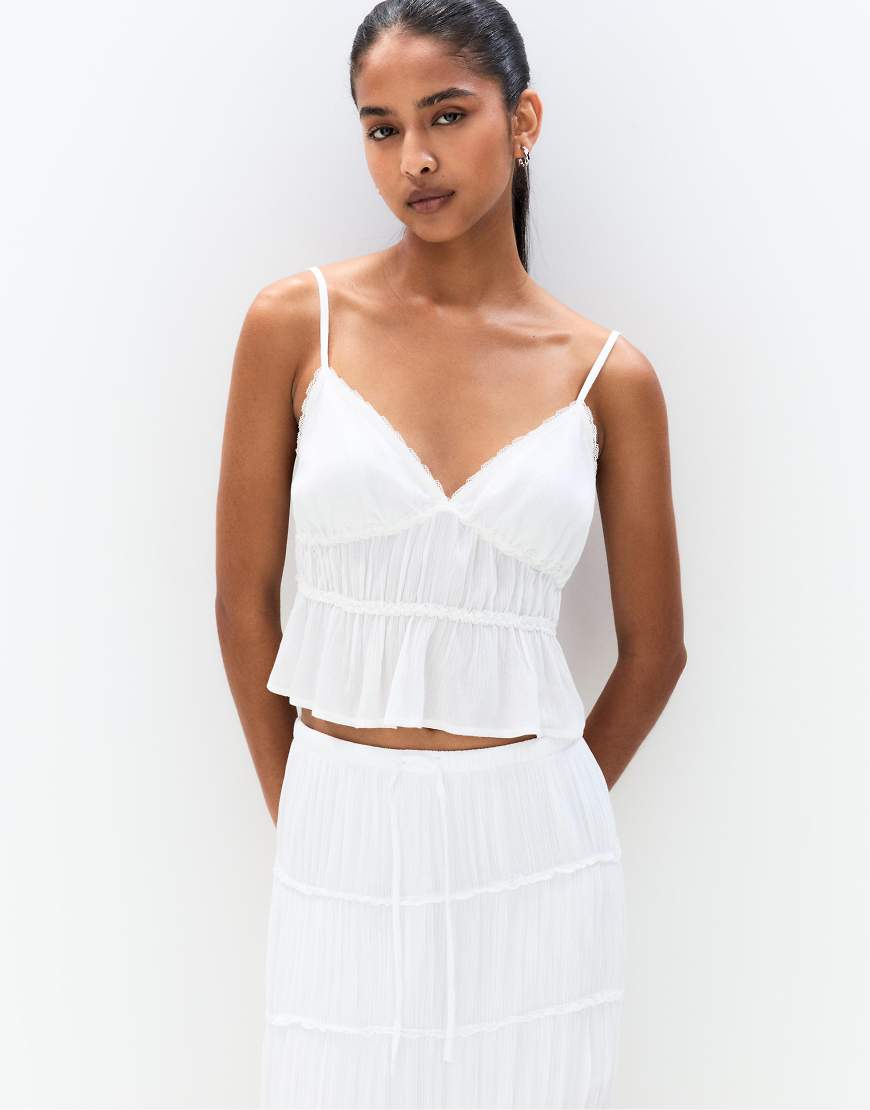 Pull & Bear - Oberteil in Weiß mit schmalen Trägern und Bahnendesign von Pull & Bear