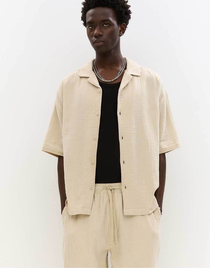 Pull & Bear - Rustikales, kurzärmliges Hemd in Ocker-Braun Pull & Bear - Rustikales, kurzärmliges Hemd in Ocker-Braun von Pull & Bear