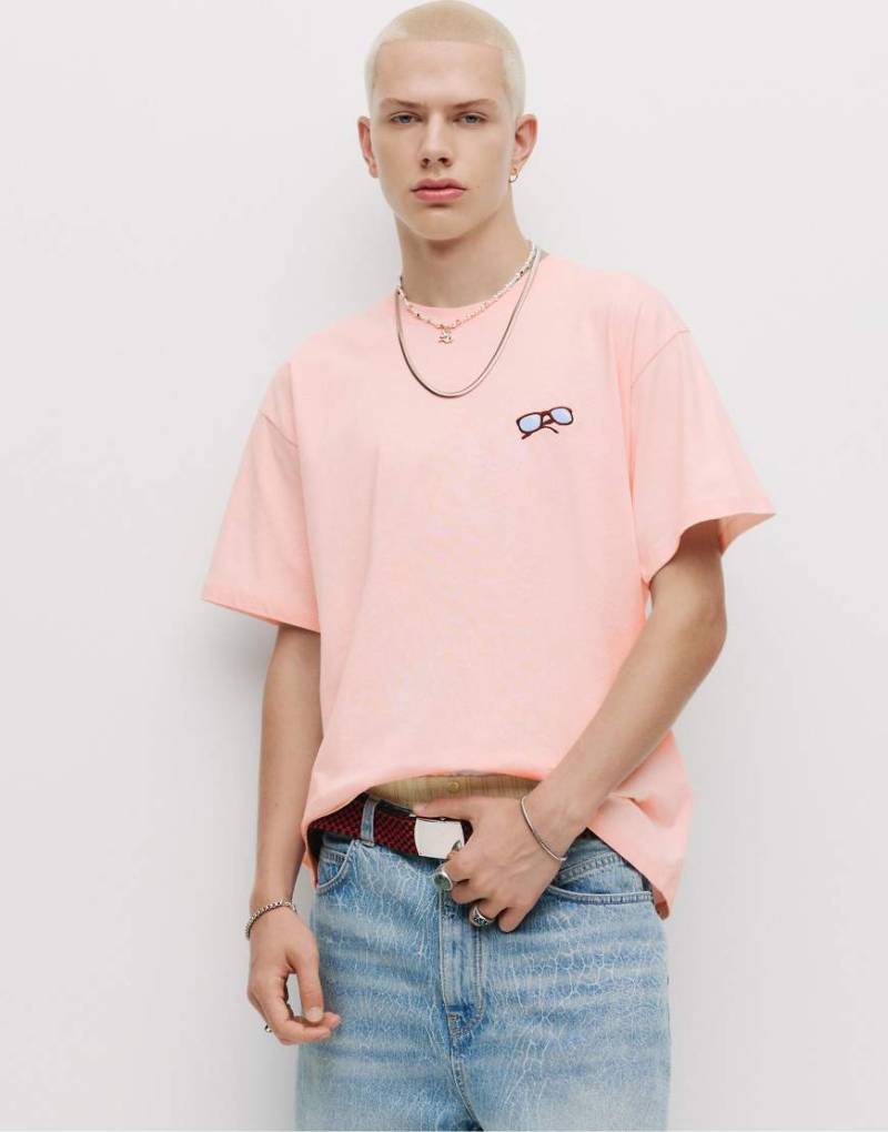 Pull & Bear - STWD - T-Shirt in Rosa mit Sonnenbrillen-Grafik von Pull & Bear