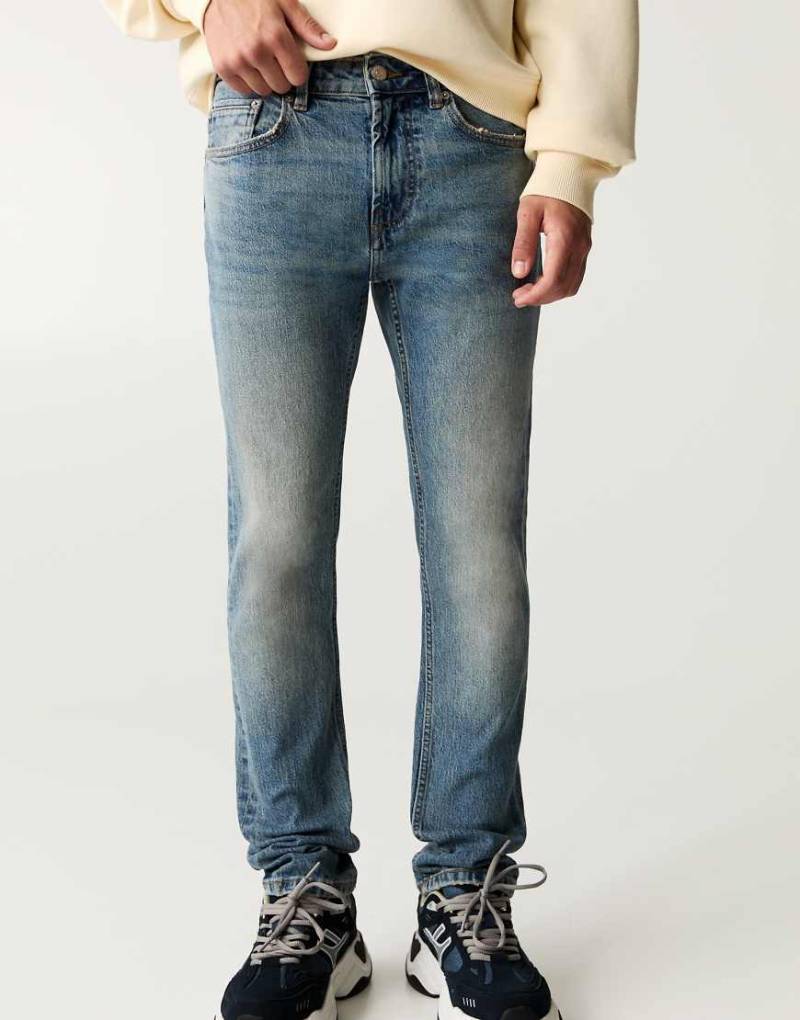 Pull & Bear - Slim Fit Jeans in Neonblau von Pull & Bear