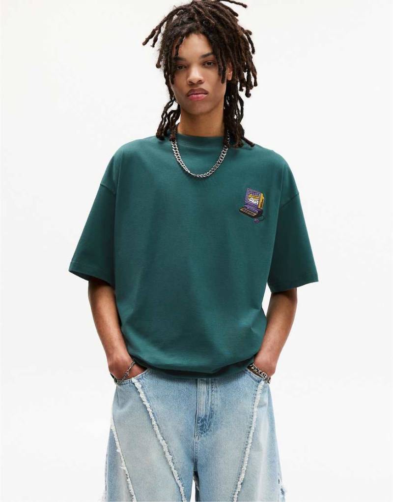 Pull & Bear - T-Shirt in Grün mit „stwd"-Stickerei Pull & Bear - T-Shirt in Grün mit „stwd"-Stickerei von Pull & Bear