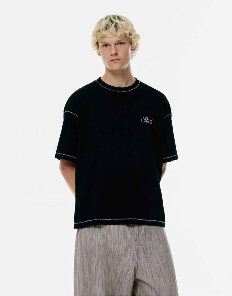 Pull & Bear - T-Shirt in Schwarz mit Kontrastnaht und „STWD Studio"-Print von Pull & Bear