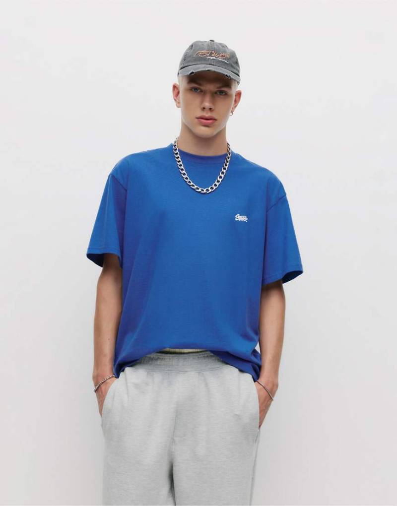 Pull & Bear - T-Shirt in Tiefblau mit „STWD"-Logo von Pull & Bear